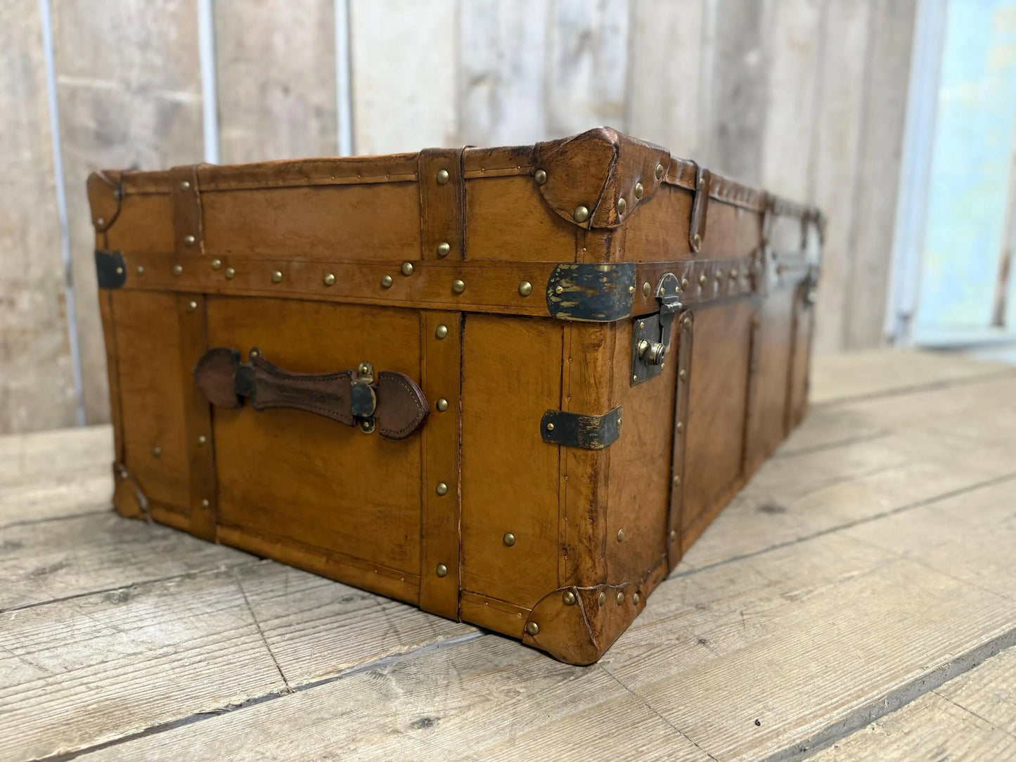 luxury tan leather coffee table trunk.