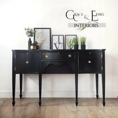 Black vintage serpentine sideboard