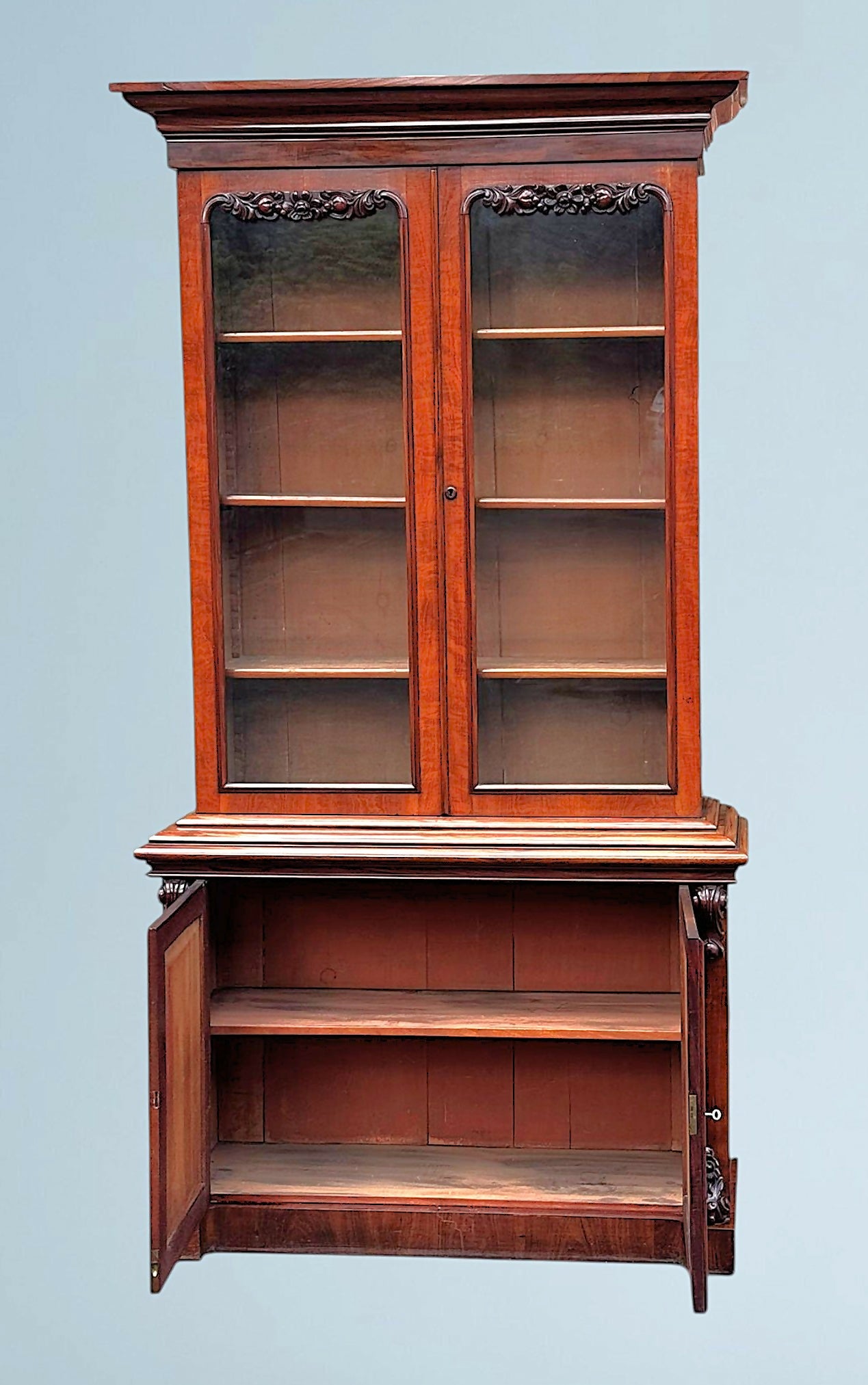 A Large Impressive Victorian Figured Mahogany Bookcase