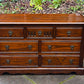 A WOOD BROTHERS OLD CHARM CARVED LIGHT OAK LONG CHEST OF DRAWERS / SIDEBOARD / DRESSER BASE