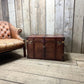 Antique leather trimmed chestnut brown campaign chest