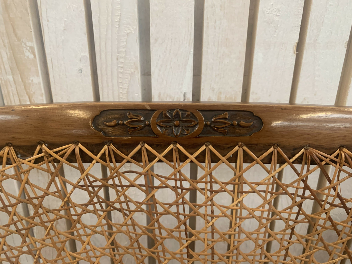 Very attractive and unique antique gold-colored cane bergère two-seater sofa.