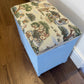 Bijou ottoman seat sky blue with Peter Rabbit themed upholstery. 45cm high 45cm long 30cm deep