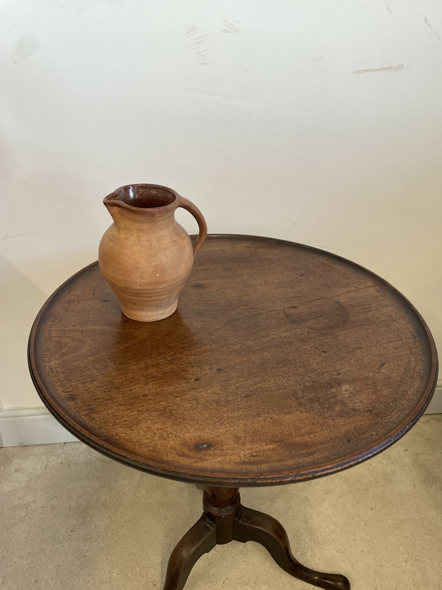 A Georgian antique oak tripod table