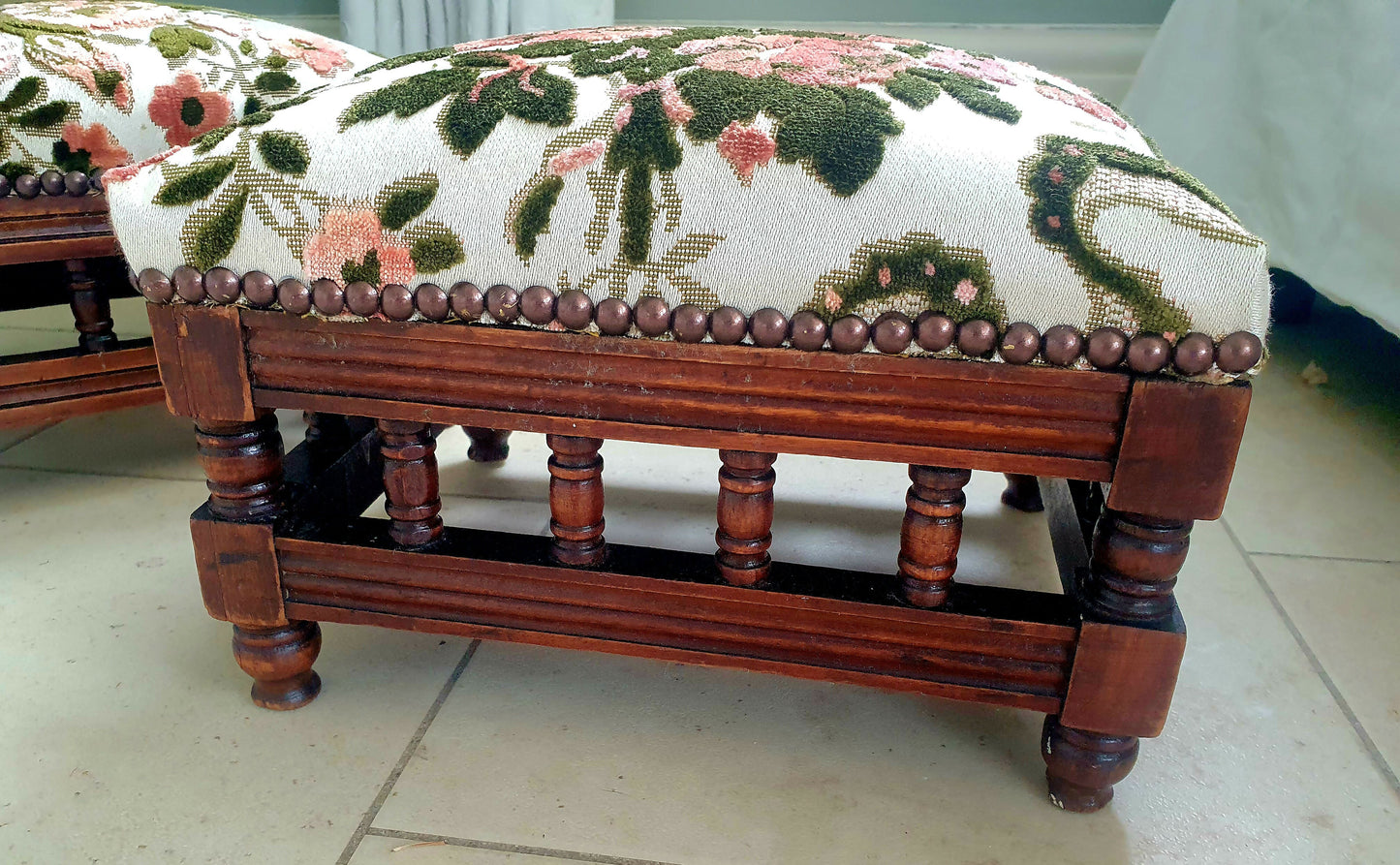 A fine Pair of late Victorian footstools. Repaired, Restored and Reupholsteted in High end French Designer fabric. Oak frames in tact.
