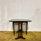 Edwardian mahogany table of small proportions resting on turned legs.8