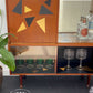 MCM Cocktail drinks cabinet in black and gold geometric retro pattern