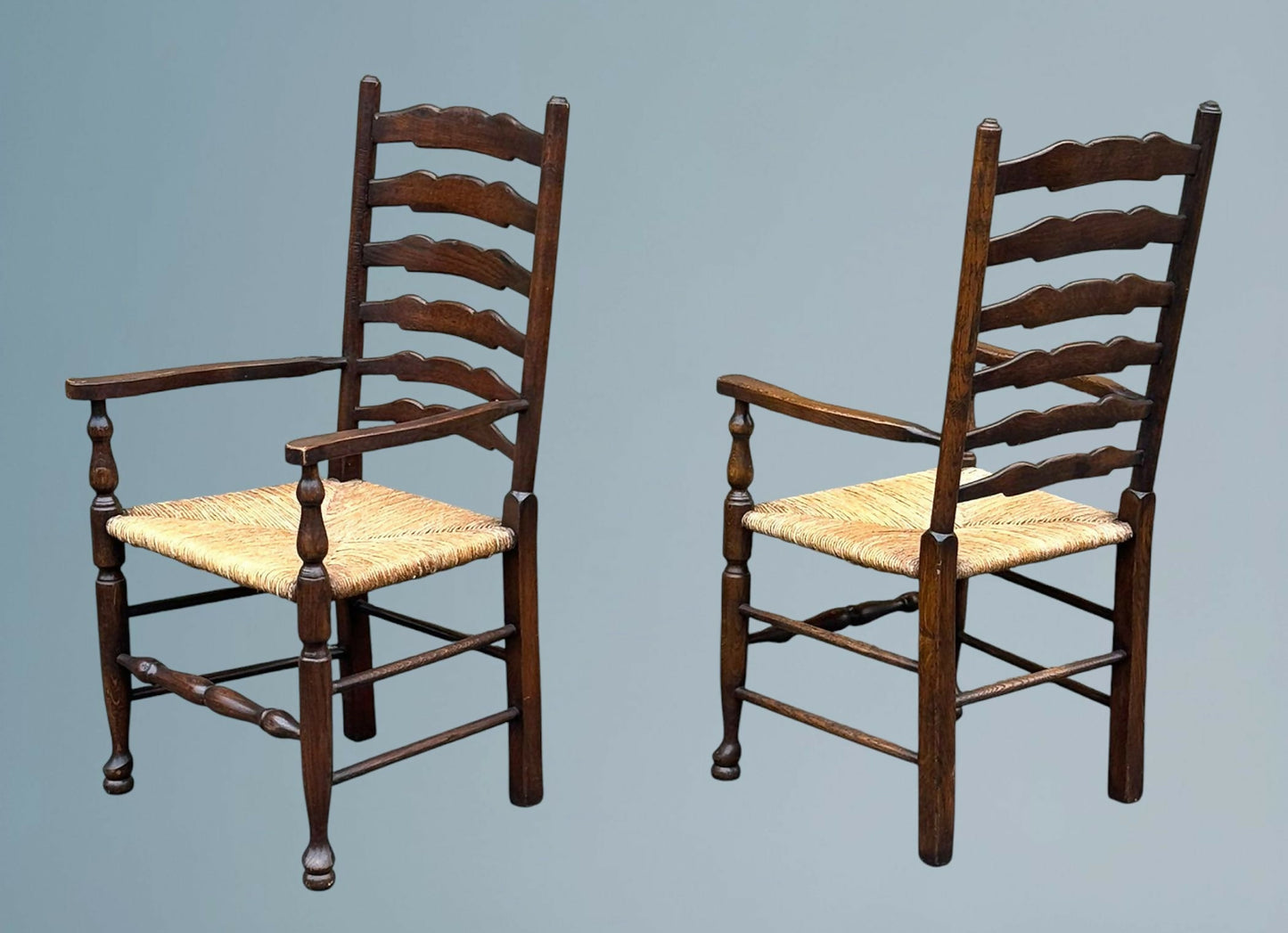 Pair of Oak Ladder Back Rush Seated Armchairs