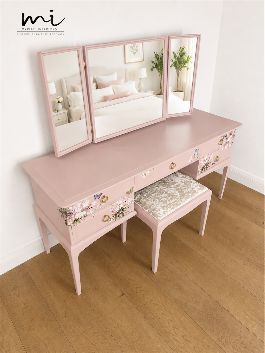 Dusky blush pink Stag Minstrel dressing table set with blossom and butterfly design.