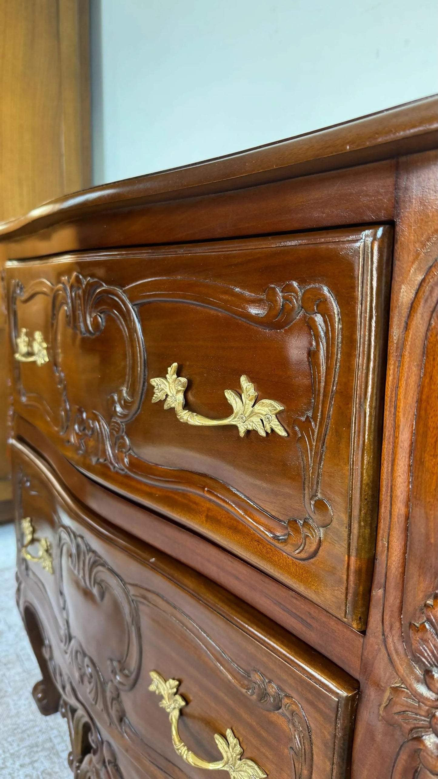 French Rococo style carved mahogany chest of drawers
