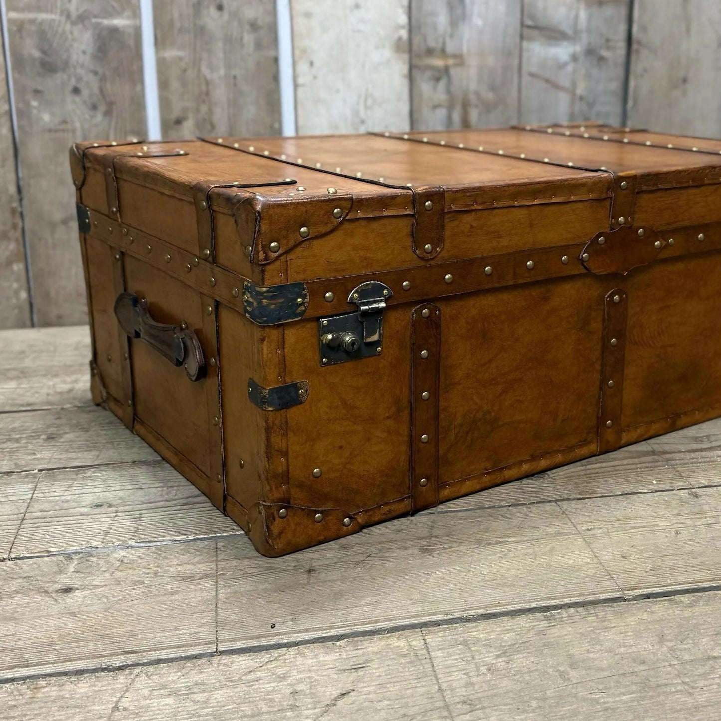 luxury tan leather coffee table trunk.