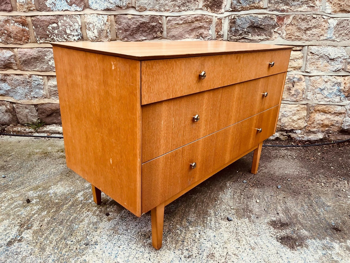 Mid-Century Teak Chest of Drawers – 4-Drawer Vintage Unit with Tapered Legs & Brass Knobs
