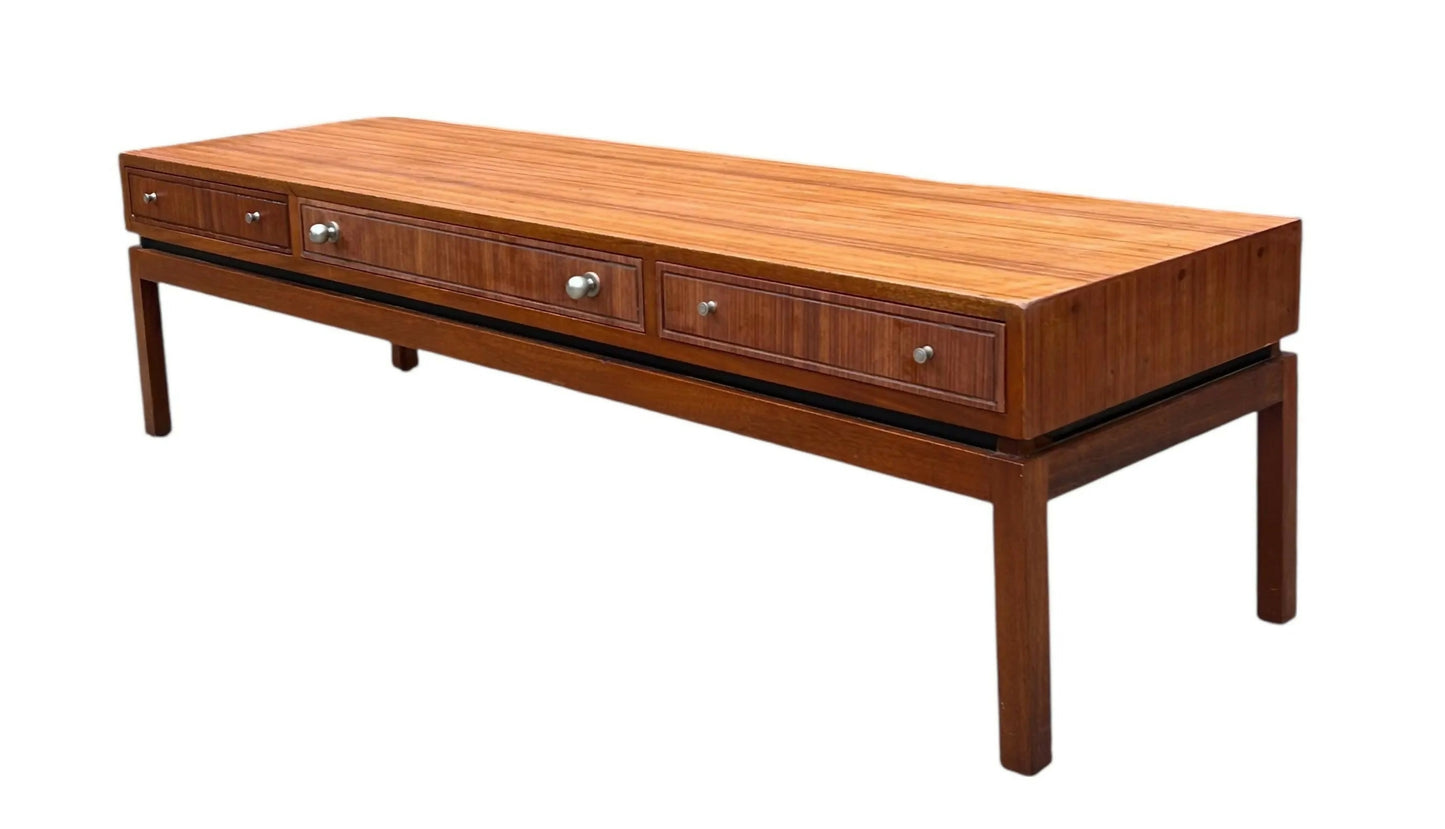 Mid-century long console coffee table by the renowned British makers Greaves and Thomas.