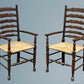 A Pair of Oak Ladder Back Rush Seated Armchairs