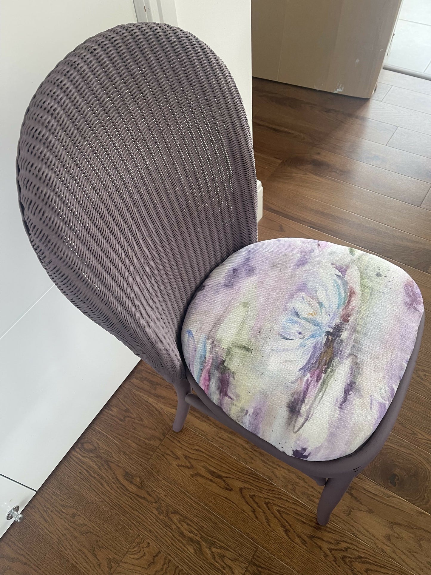 Stylish Lloyd loom accent chair very Matt aubergine paint and matching cotton lily themed fabric