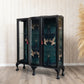 Available: Exquisite Art Deco drinks cabinet decoupaged in a striking blend of emerald green, subltle gold and black crane fabric.