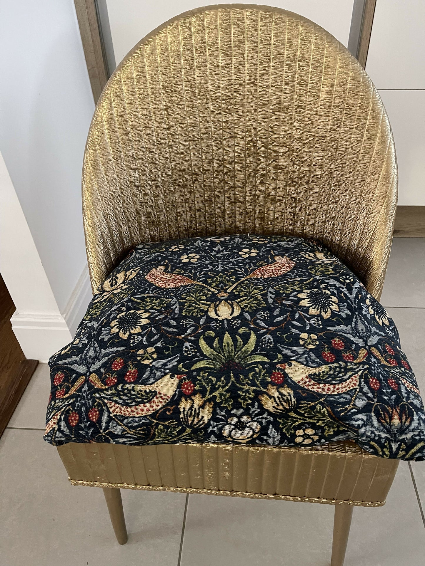 Accent chair. Gold painted wipe clean plastic with your choice of fabric seat. Removable with small storage space beneath.