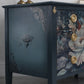 Vintage chest of drawers with floral design