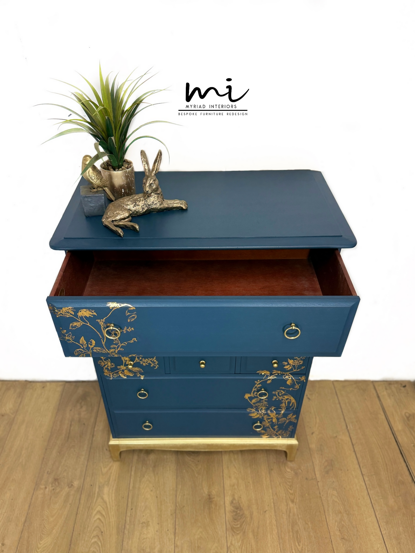 Refinished Stag Minstrel Tallboy Chest Of Drawers In Navy Blue With Gold Foil Floral Bird Design
