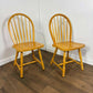 A Pair of Contemporary Hoop Spindle Back Chairs