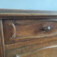A near pair of antique French walnut and marble bedside tables