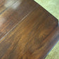 Edwardian mahogany table of small proportions resting on turned legs.6