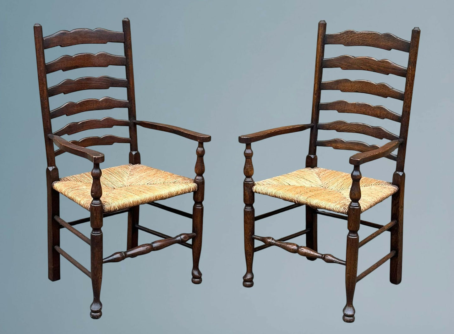 Pair of Oak Ladder Back Rush Seated Armchairs