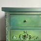 Vintage pine pair of bedside drawers, hand painted green and gold
