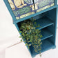 Teal Cabinet With Decorative Front