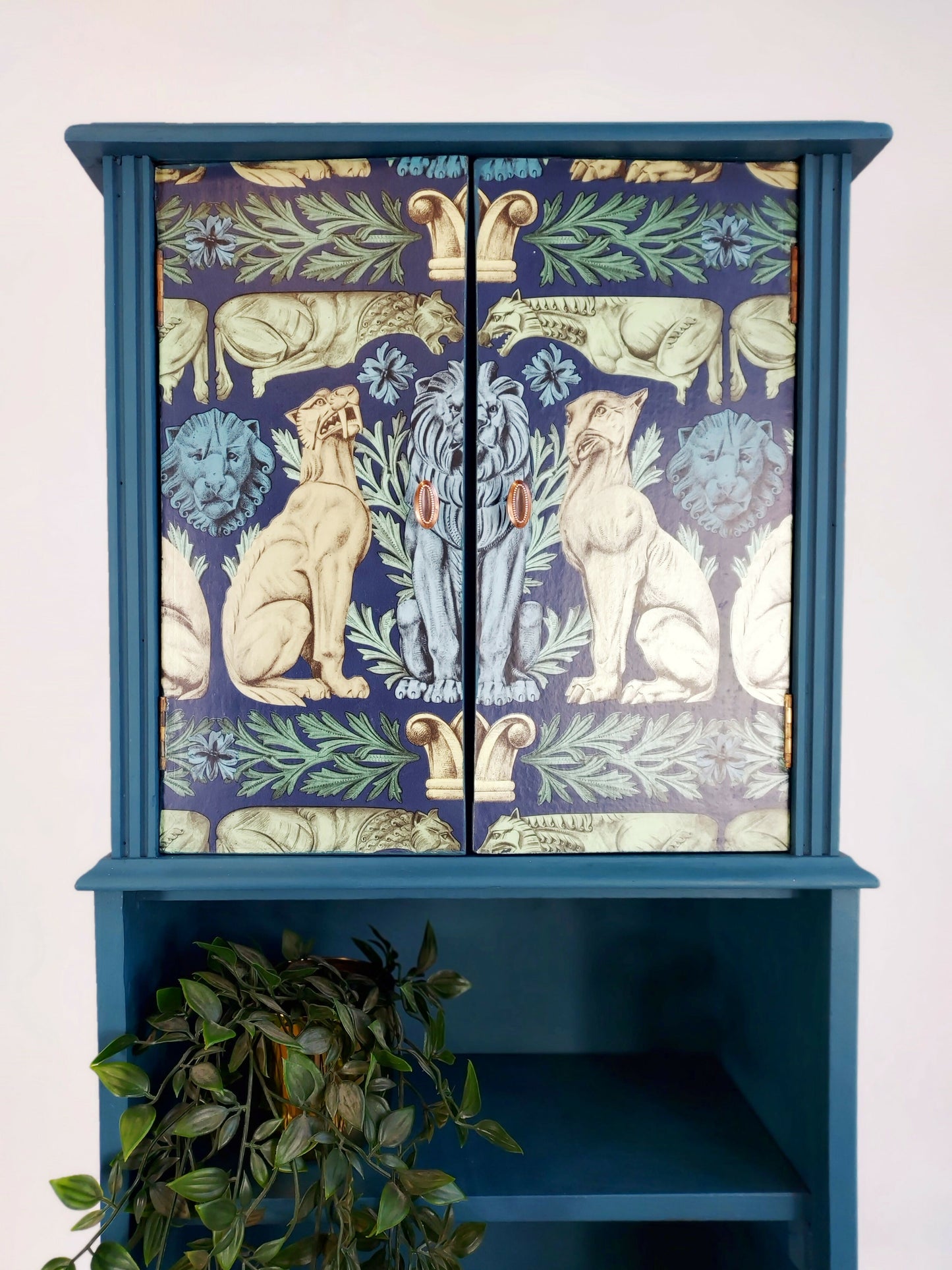 Teal Cabinet With Decorative Front