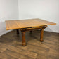Early 20th Century Golden Oak Draw Leaf Dining Table