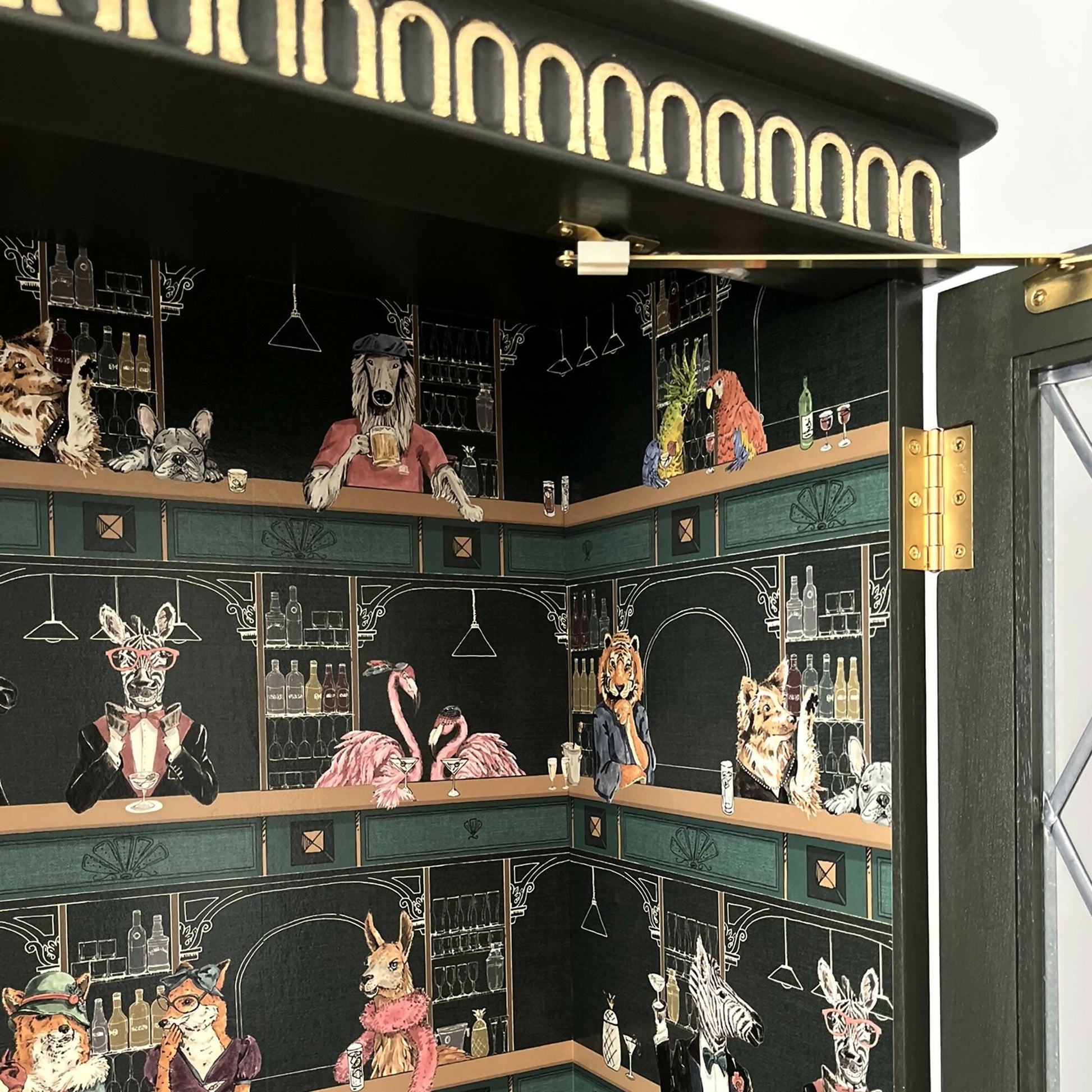 Antique style display cabinet with animals in the bar, painted green and gold guilded - Copy