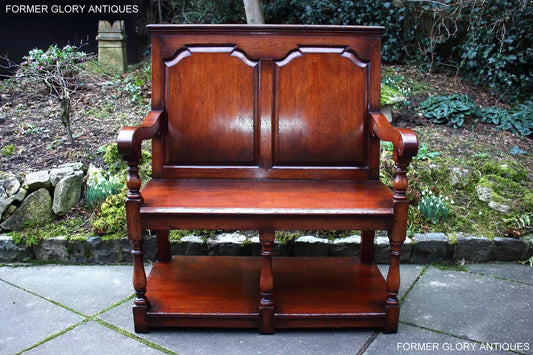 A TITCHMARSH AND GOODWIN SOLID OAK TAVERN SEAT / SETTLE / PEW / HALL ARMCHAIR / BENCH.