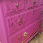 Stag chest of drawers in hot pink and gold