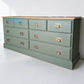 Large olive green rustic pine merchant sideboard/ chest of drawers