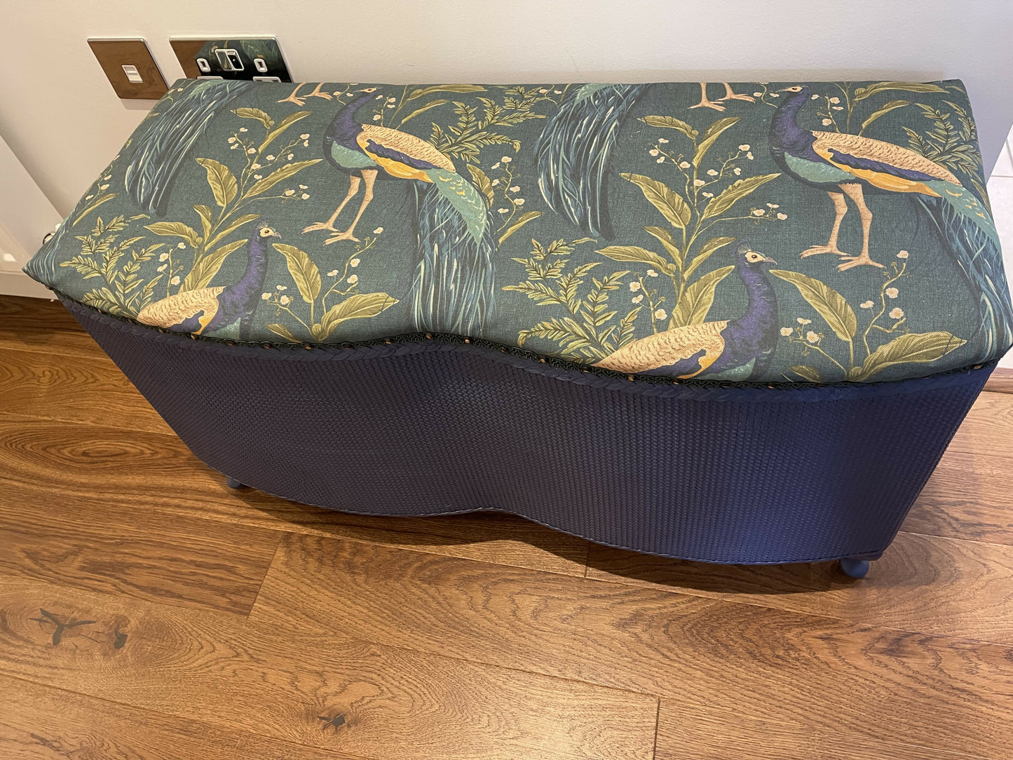 Peacock themed ottoman. Mid century refurbished