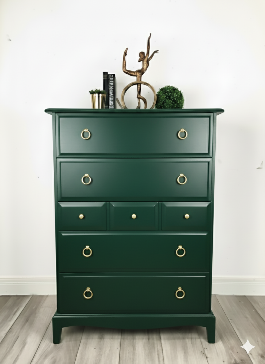 Stag minstrel tallboy chest of drawers in dark green