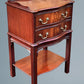 A Figured Mahogany Serpentine Chest of Drawers / Bedside Chest