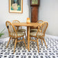Four Ercol Windsor 370 Dining Chairs with n Elm Ercol Drop Leaf Dining Table