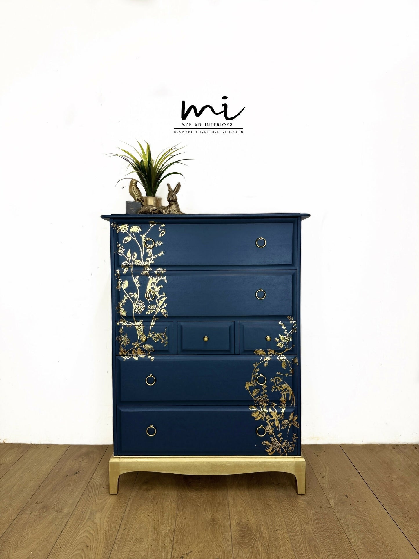 Refinished Stag Minstrel Tallboy Chest Of Drawers In Navy Blue With Gold Foil Floral Bird Design