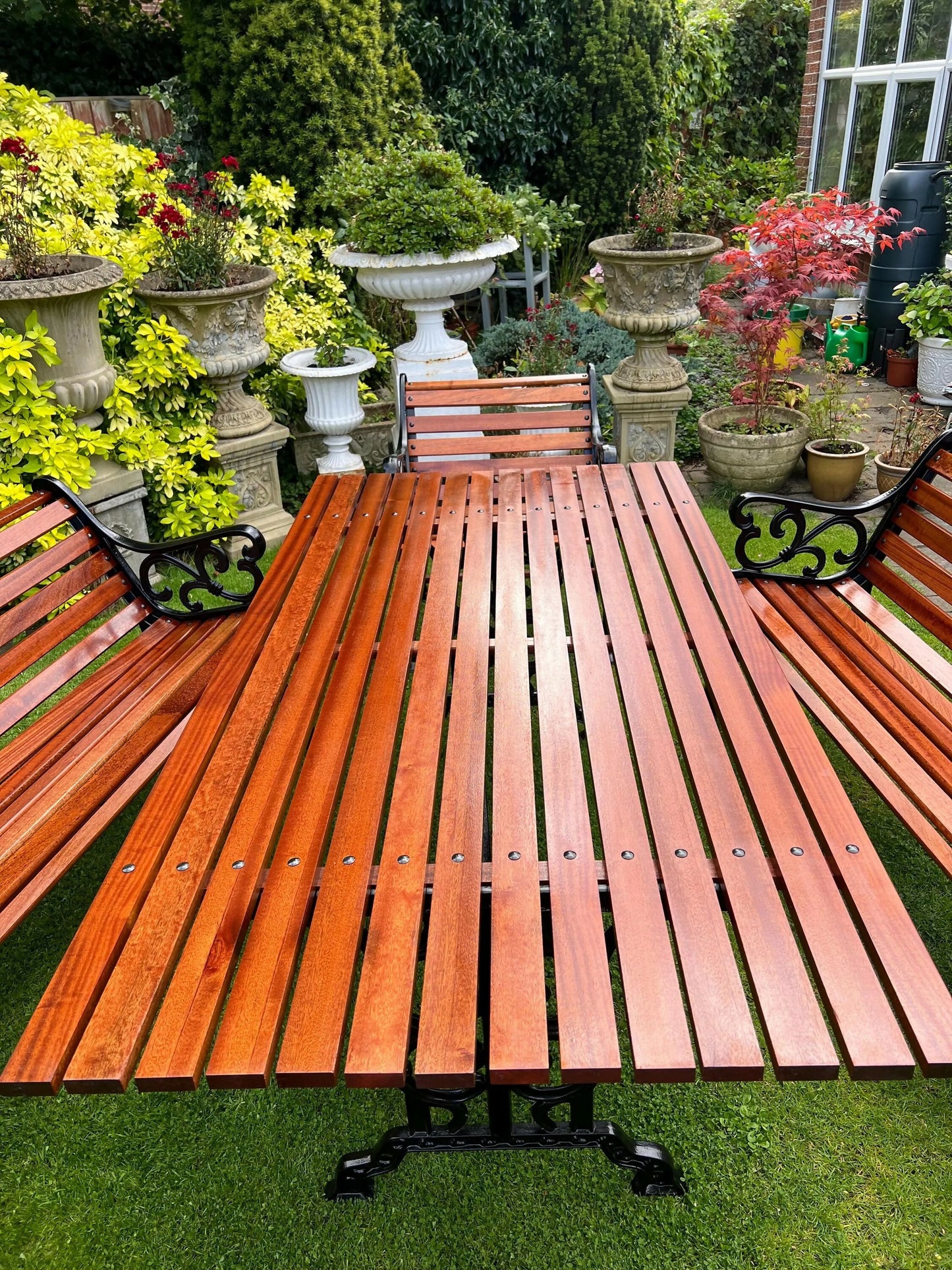 Black Vintage Cast Iron Patio Set adorned with Sapele Wood 3 seater Benches included