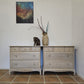 Pair Stag minstrel chest of drawers