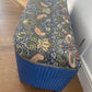 Mid century bright blue repainted ottoman with new William Morris style fabric