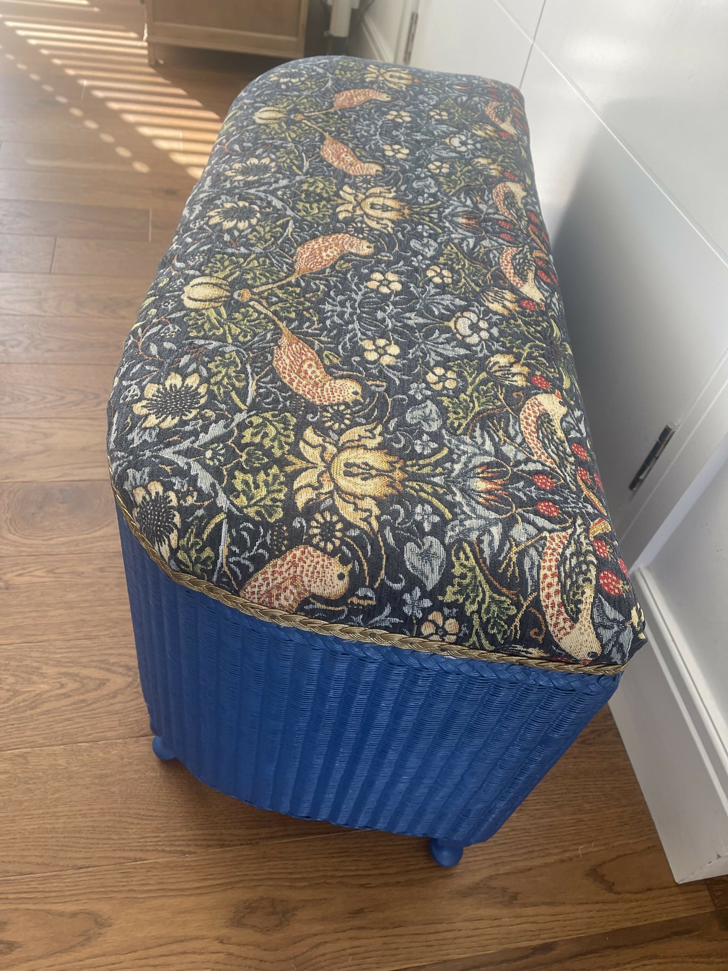Mid century bright blue repainted ottoman with new William Morris style fabric