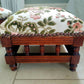 A fine Pair of late Victorian footstools. Repaired, Restored and Reupholsteted in High end French Designer fabric. Oak frames in tact.