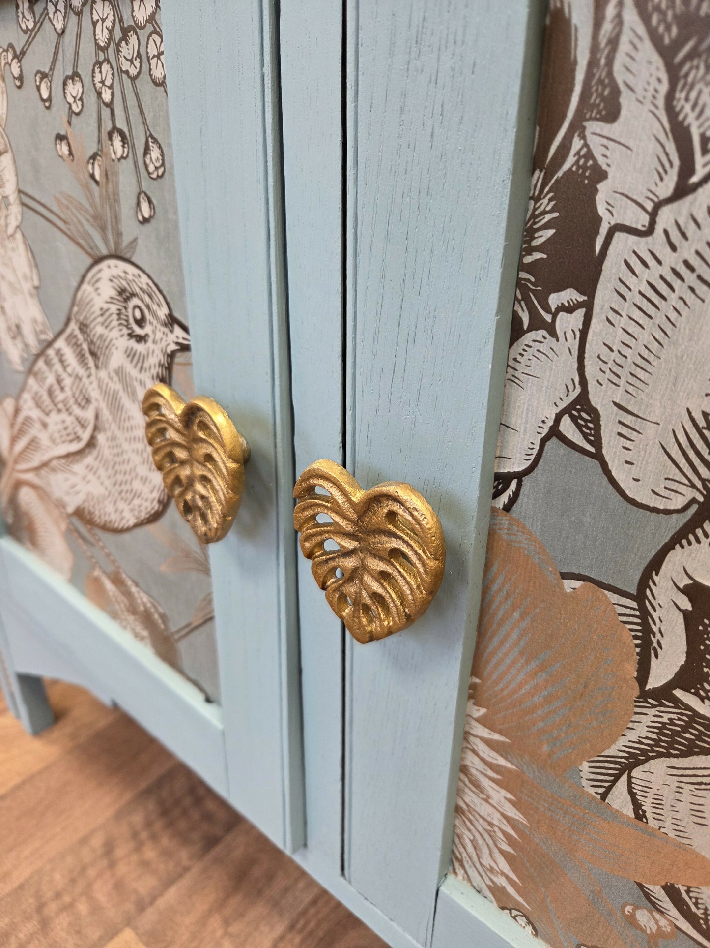 Vintage pale blue and gold drawered cupboard.
