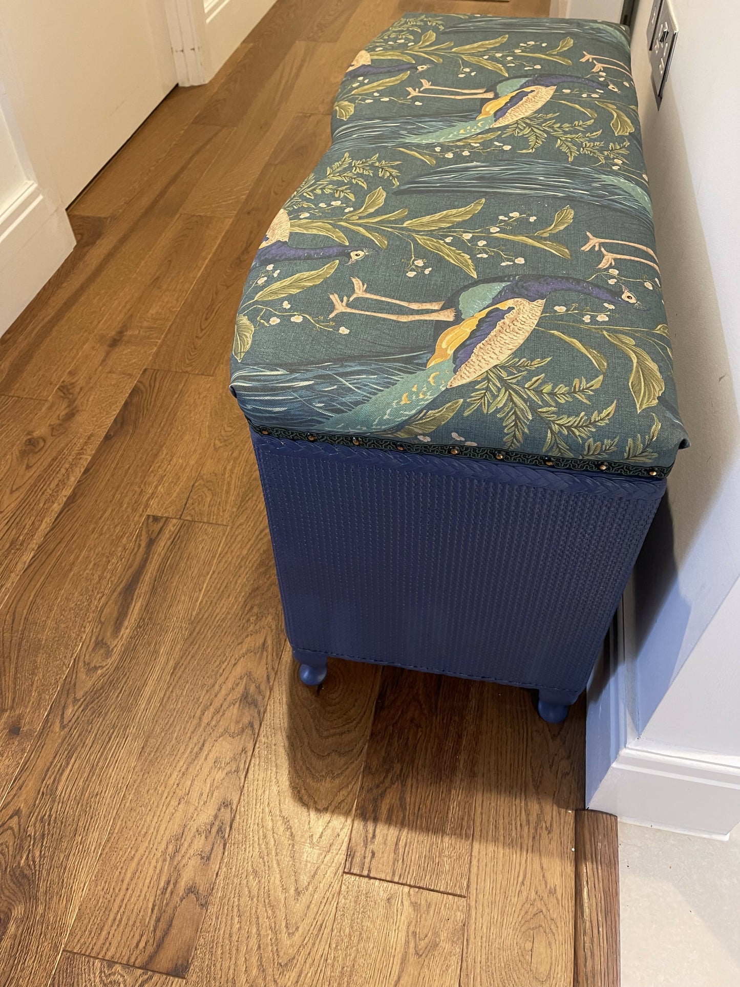 Peacock themed ottoman. Mid century refurbished