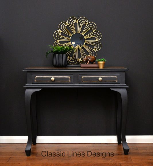 Black and bronze console table