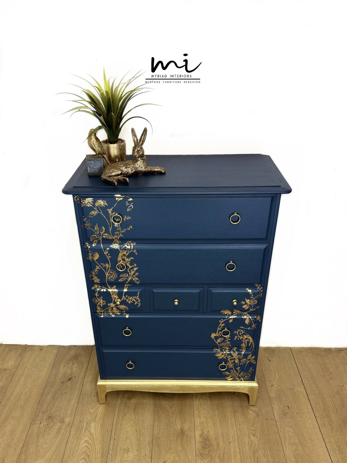 Refinished Stag Minstrel Tallboy Chest Of Drawers In Navy Blue With Gold Foil Floral Bird Design