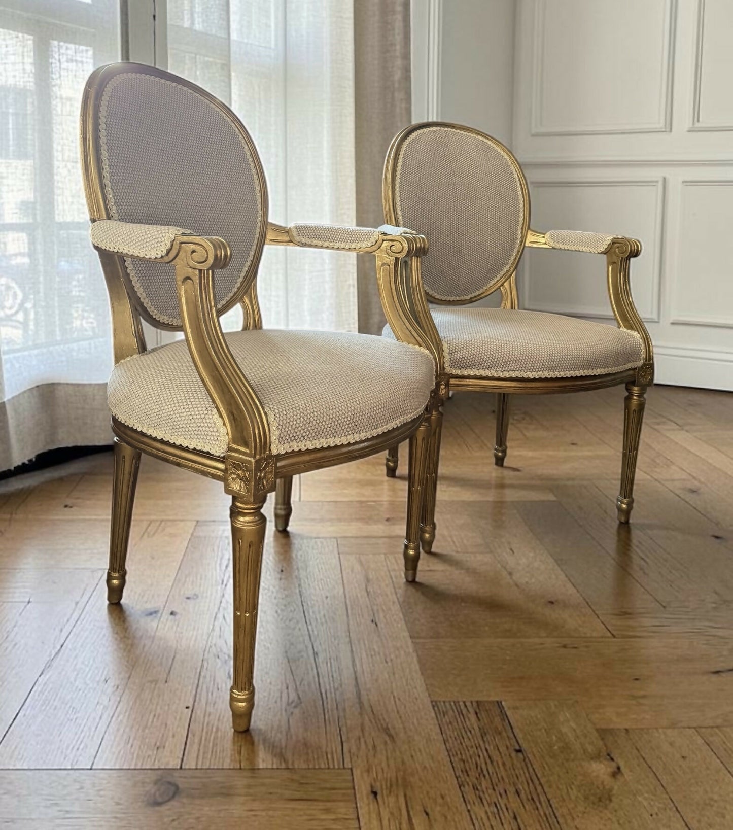 Stunning pair of freshly upholstered Louis XVI antique armchairs